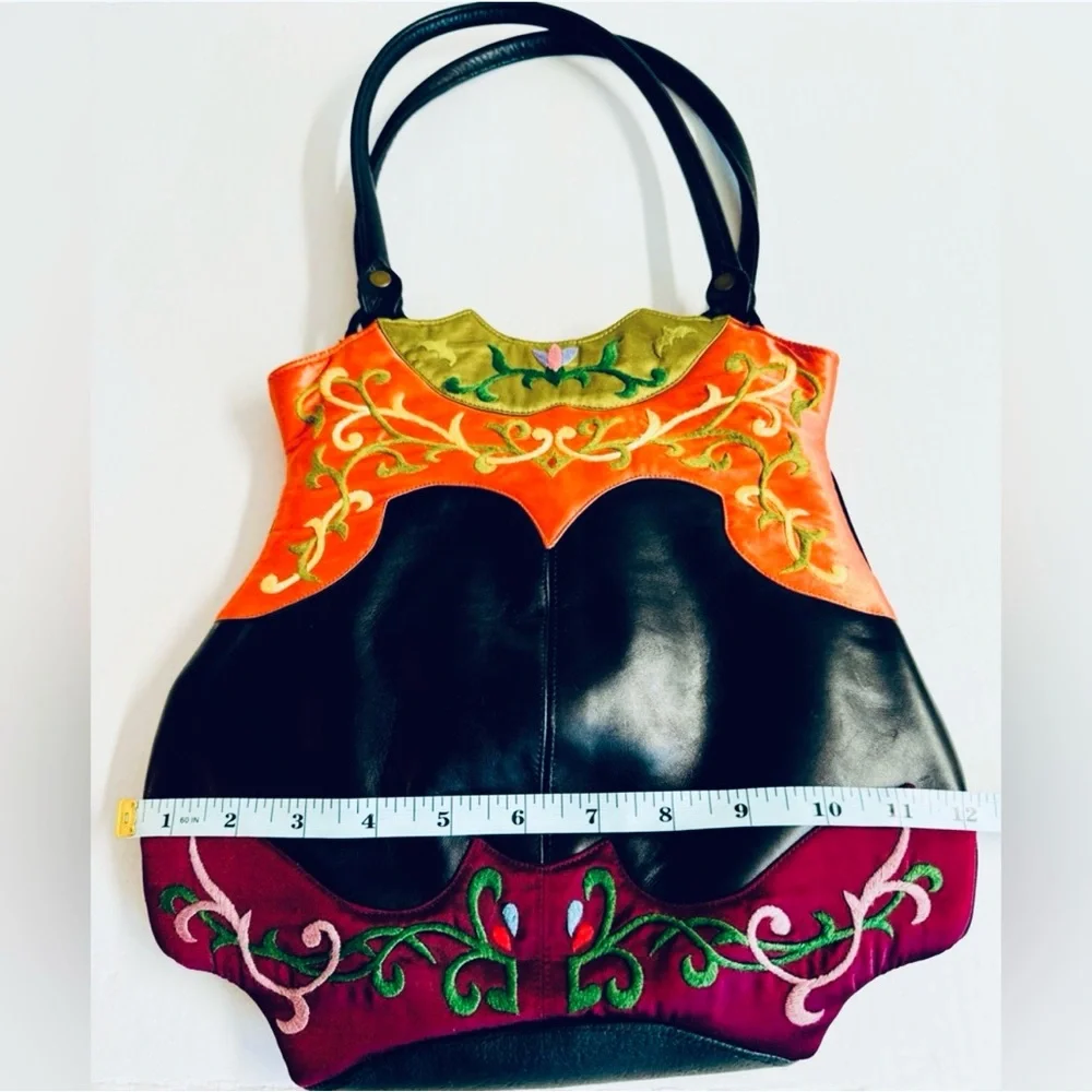 Vtg.Oovoo-Black shiny leather with orange+purple with hand embroidered silk.